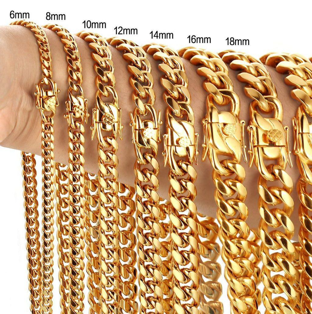 Gold chain necklace displayed on a hand with measurements indicated.