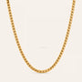 Gold chain on a light beige background