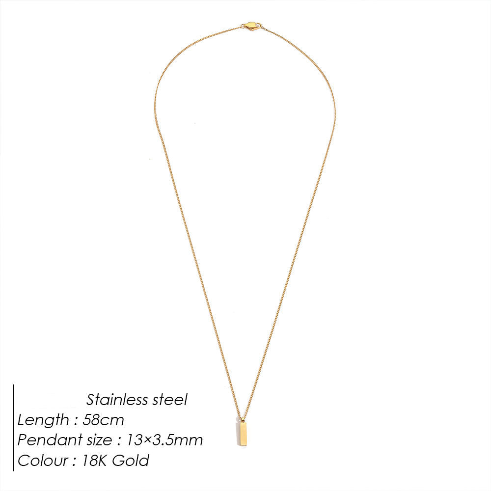 Gold necklace with pendant on a white background