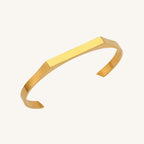 Gold bracelet on a white background