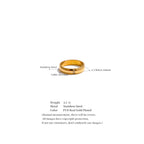 Gold ring with cubic zirconia on a white background