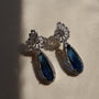 Sapphire Blue Teardrop Halo American Diamond Drop Earrings | CARRYALLCO