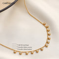 Gold necklace with Carryalico branding on a light background