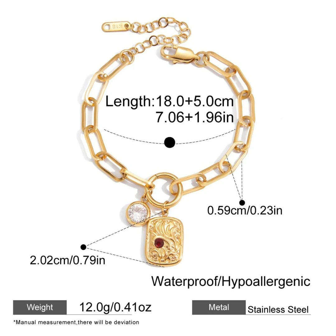 Gold bracelet with measurements and features on a white background