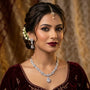 Woman wearing jewelry with a blurred background