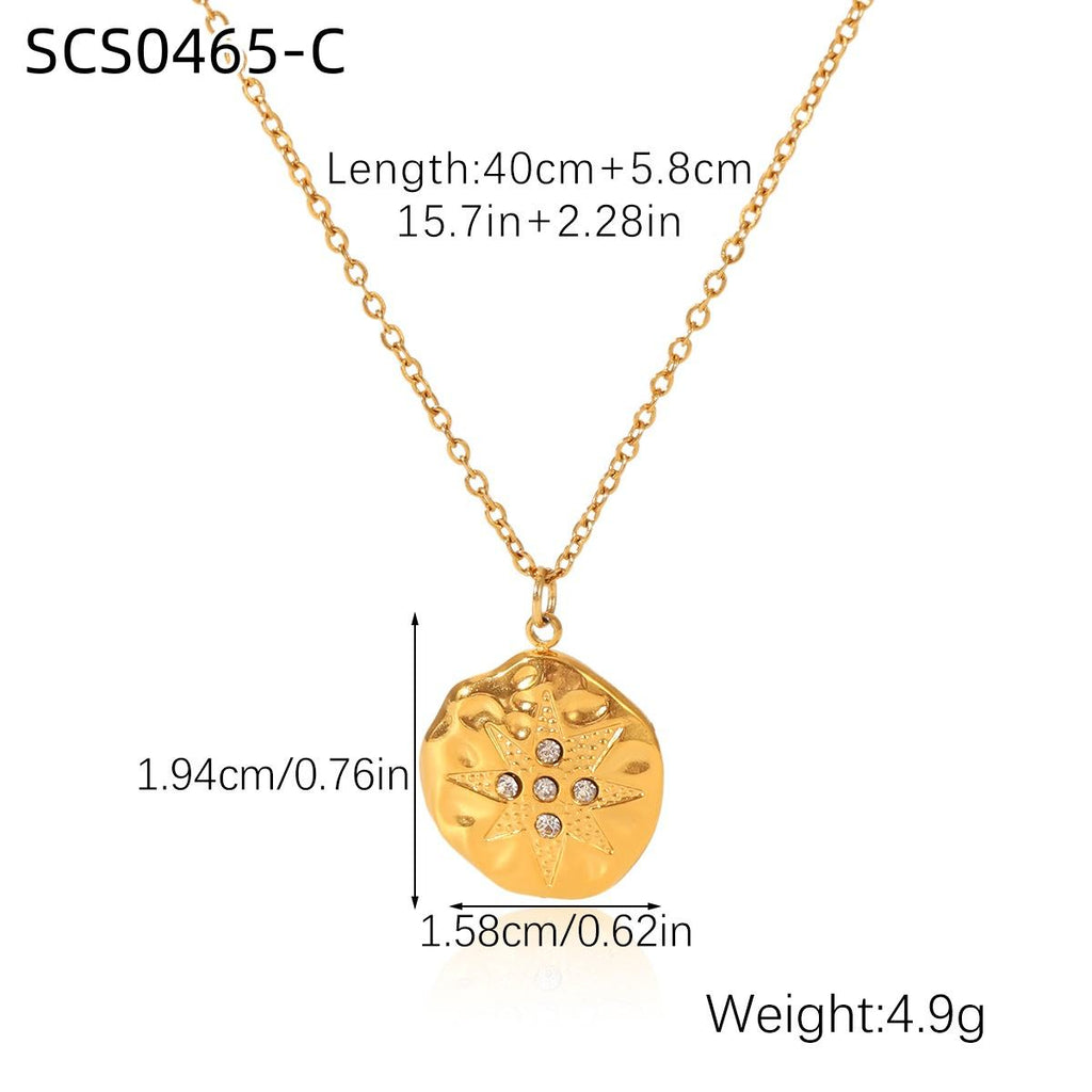 Gold necklace with pendant showing measurements on a white background