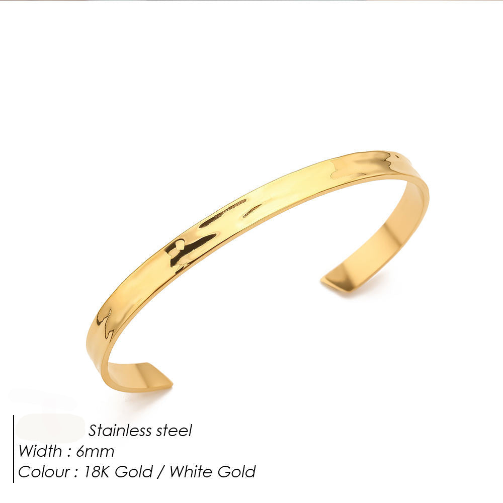 Gold bracelet on a white background with product details.