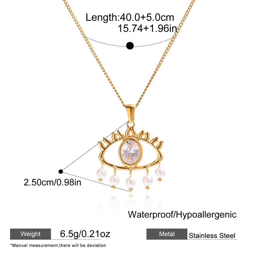 Gold necklace with eye-shaped pendant and measurements on a white background