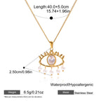 Gold necklace with eye-shaped pendant and measurements on a white background