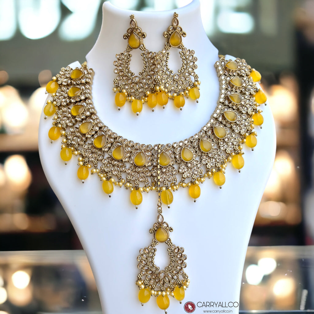 Carryallco Antique Gold-Plated Reverse AD Yellow Necklace Set with Mangtika Carryallco