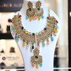 Carryallco Gold-Plated Reverse AD Multicolor Stones Necklace Set with Mangtika Carryallco