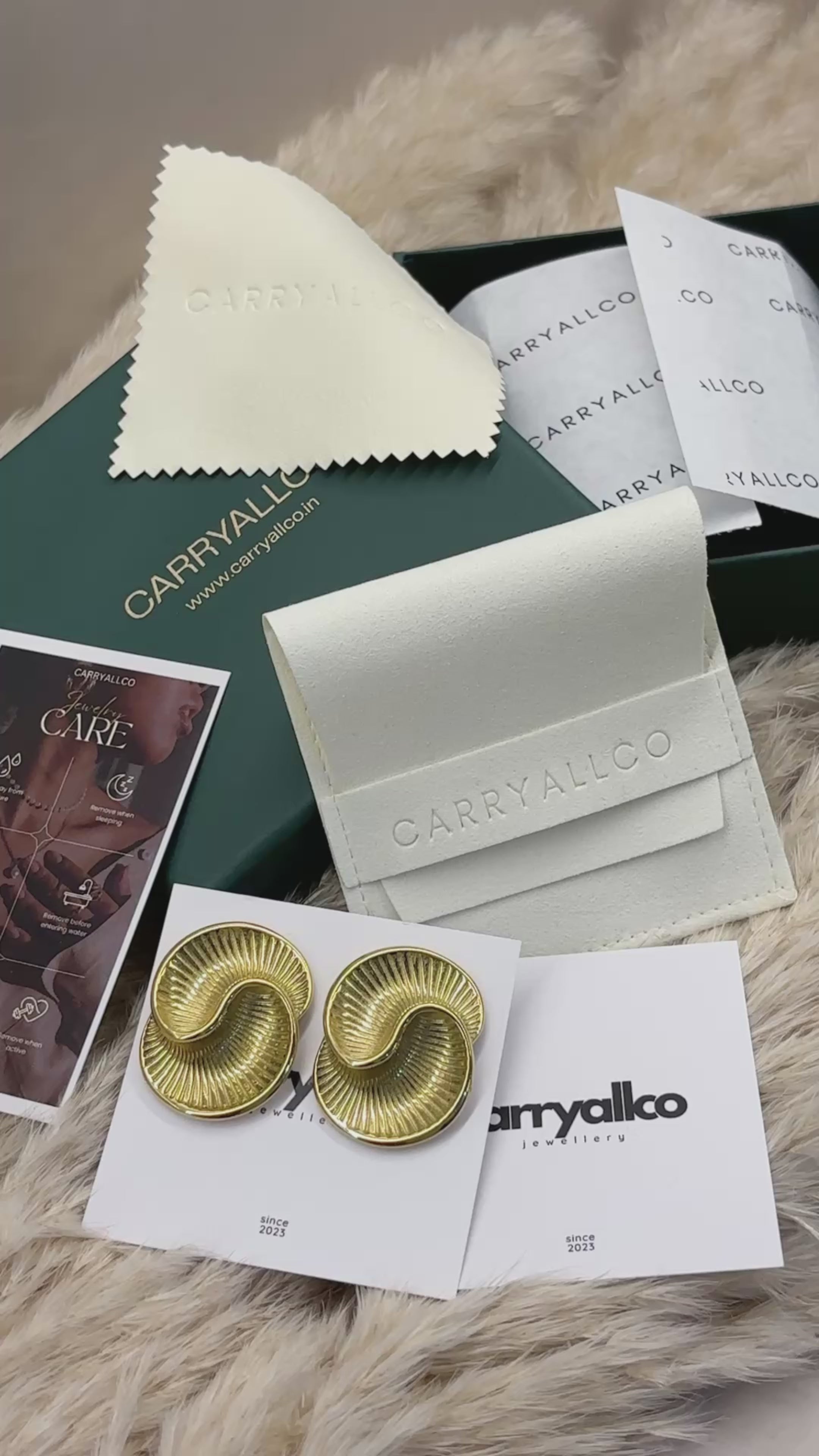 Carryallco Bold Swirl Stud Earrings-18K Gold Plated